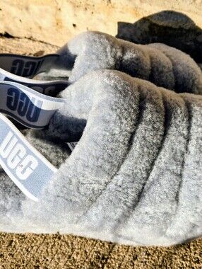 UGG Light Blue Fuzzy Slip-On Slippers with Tan Soles